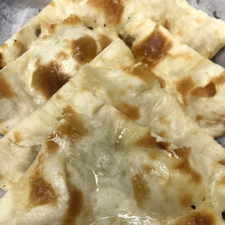 Freshly Baked Naan: A Taste of India